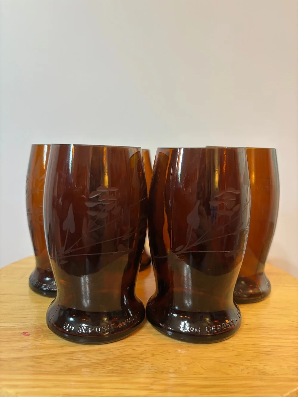 A set of six upcycled vintage amber beer bottle drinking glasses